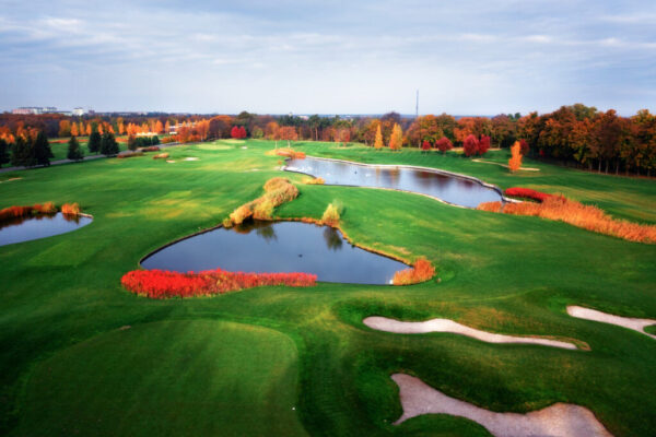 Corporate web design for engineers and geologists. Large, green golf course